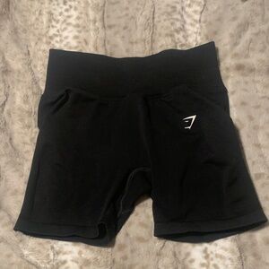 Black mid length gymshark buker shorts